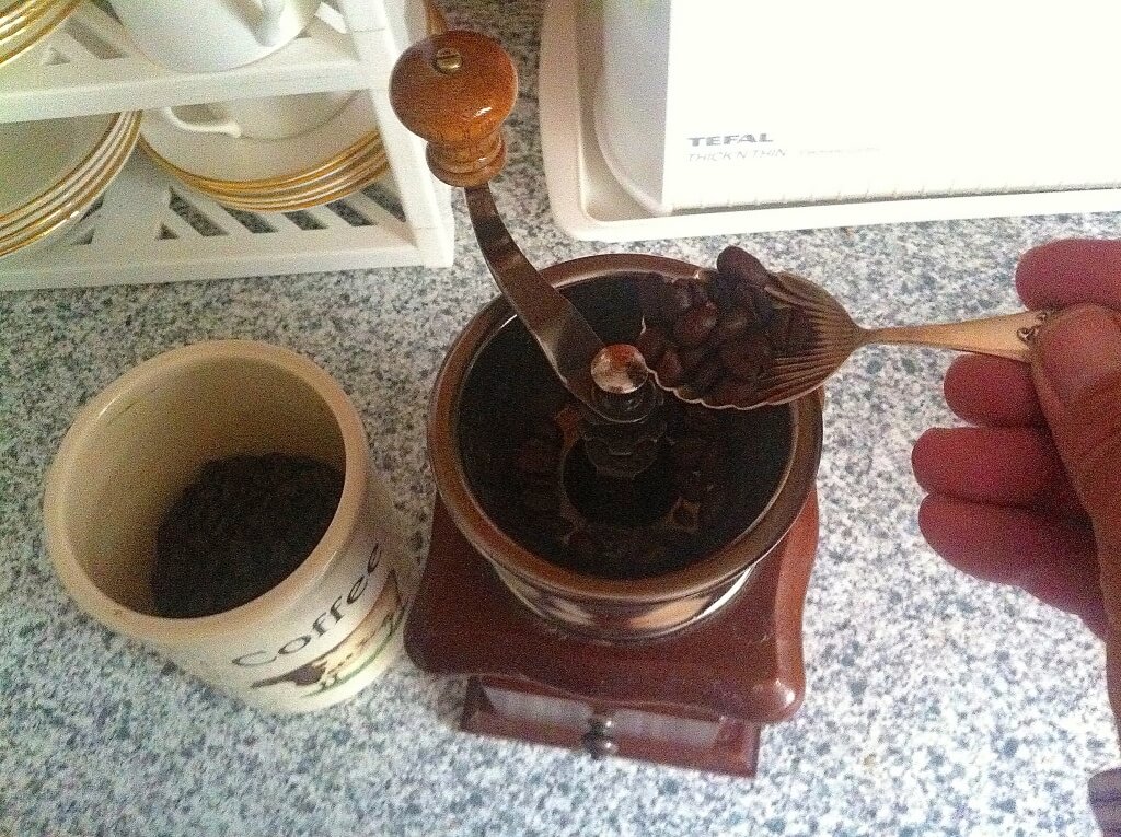 An antique coffee grinder